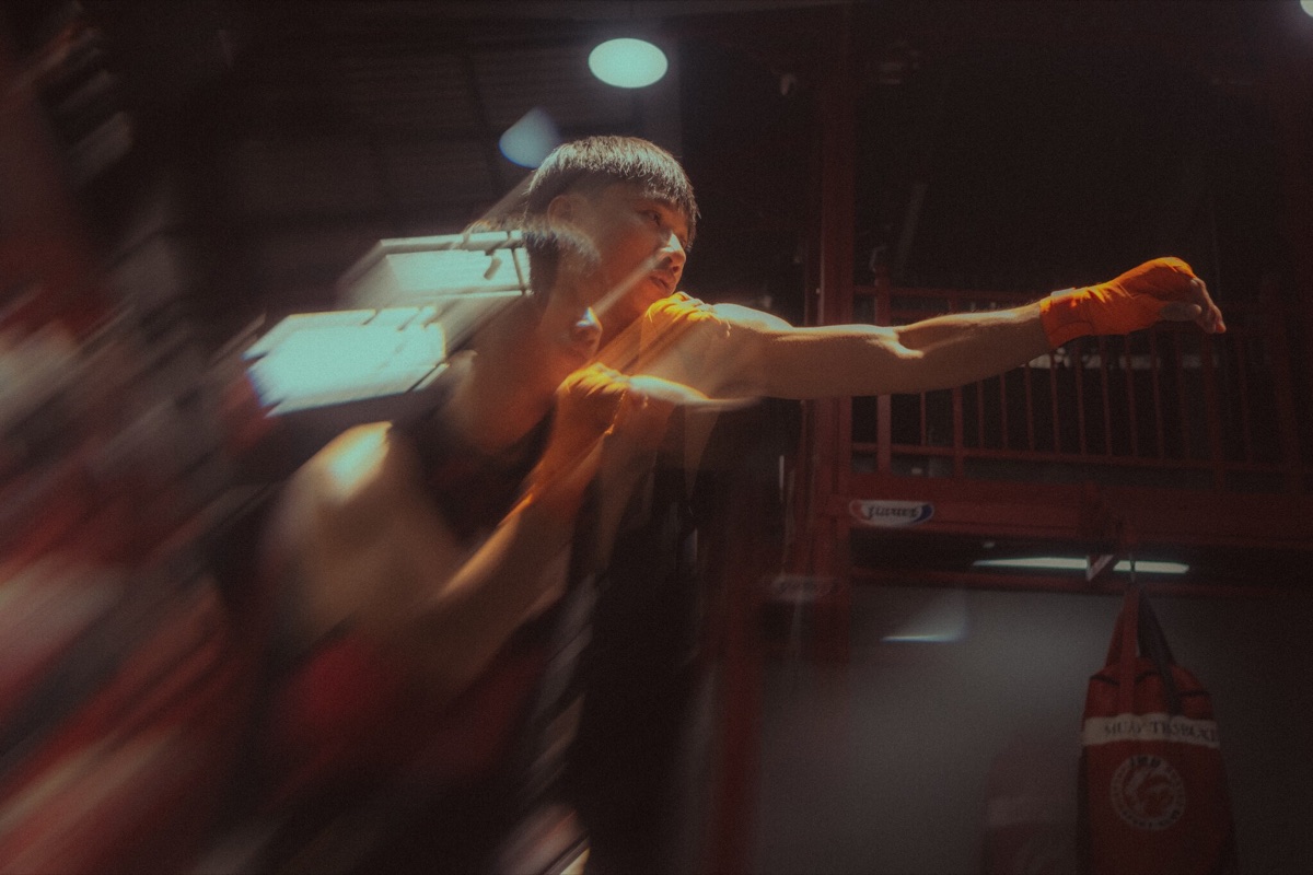 Phap mid punch during a training session in Da Nang
