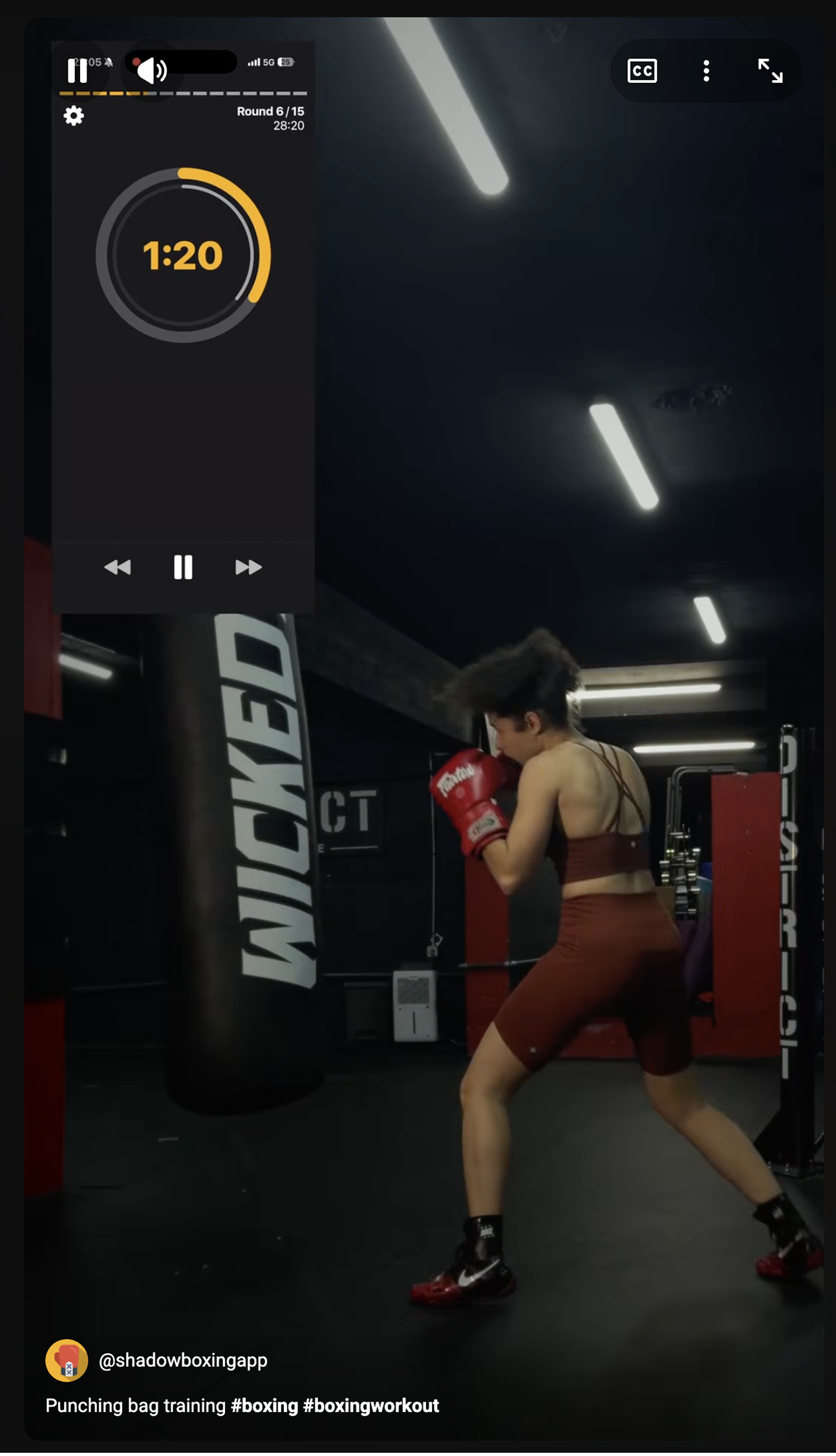 Someone training on the punching bag with the boxing app