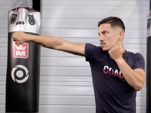 Boxer throwing a cross, from the full cross tutorial