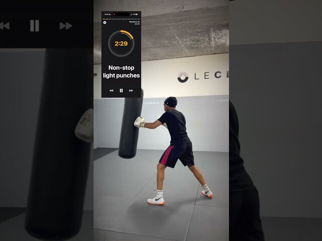 Light Punches, Then Power: A Heavy Bag Round on Video
