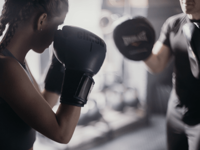 Building muscle memory for boxing with pad work